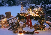 Christmas decorations on a snowy terrace