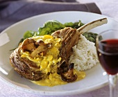Veal cutlet with almond curry sauce, chanterelles & rice