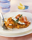 Potato rosti with herb soft cheese and smoked salmon