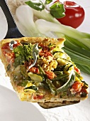 A piece of vegetable tart with walnuts