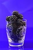 Fresh blackberries in a glass