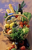 Fruit, vegetables and other food in a basket