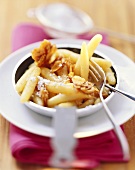 Sweet potato noodles with almond praline & icing sugar