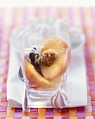 Steamed peaches with marzipan and praline stuffing