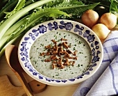 Creamed herb soup with chanterelles