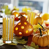 Pumpkins with lighted candles