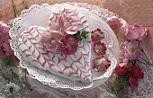 Heart-shaped cake with rose decoration