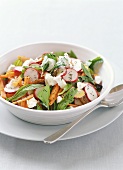 Radish and carrot salad with goat's cheese