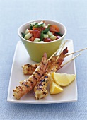 Grilled skewered prawns with tomato & cucumber salad