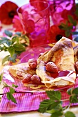 Pancakes with cream filling and raspberries