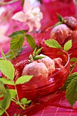 Two bowls of raspberry ice cream