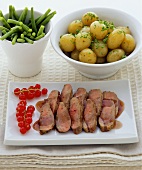 Duck breast with boiled potatoes and green beans