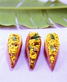 Curried rice in banana flower petals