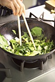 Preparing pak choi with oyster sauce
