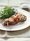 Tomatoes on grilled aubergine and veal