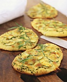 Pizzas with fennel, courgettes and tarragon
