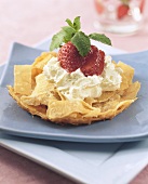 Filo pastry case with cream and strawberries