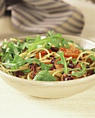 Spaghetti with tomatoes, olives and rocket
