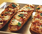 Three pizza baguettes