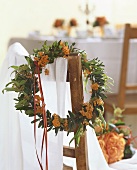 Asclepia wreath hanging on a chair