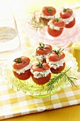 Tomatoes stuffed with avocado and shrimps