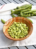 Bowls of Fresh Pea Pods with Peas