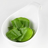 Pieces of Aloe vera leaves in a bowl