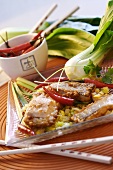 Fried fish on bed of vegetables