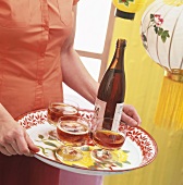 Tray with plum wine and three glasses