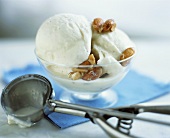 Vanilla ice cream with pecans in sundae glass