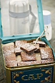 Chocolate squares in a tin for picnic