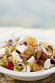 Potato salad with goat's cheese and grapes