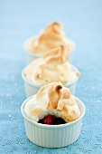 Raspberry and blueberry dessert with meringue topping