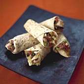 Wraps filled with chicken breast and vegetables