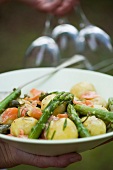 Warm potato salad with asparagus and smoked salmon