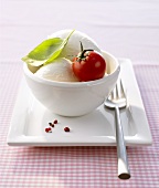 Tomato, mozzarella and basil in a small bowl