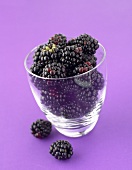 Fresh blackberries in a glass