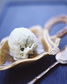 A scoop of pistachio ice cream