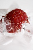 A raspberry ice cube