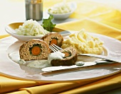 Meatloaf with vegetable stuffing, mashed potato & herb sauce