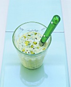 Remoulade sauce in a glass with a spoon