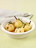 Spicy poached pears with rosemary and chili
