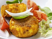Corn cakes with salad