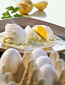 Poached eggs with parsley sauce