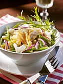 Bean salad with pieces of cod
