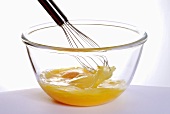 Beating eggs with a whisk