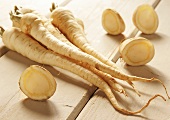 Whole parsnips and four slices