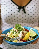 Quinoa salad with mango and shrimps