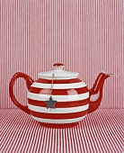 Striped teapot with tea ball