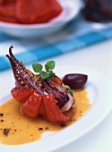 Stuffed squid with tomato and shellfish sauce